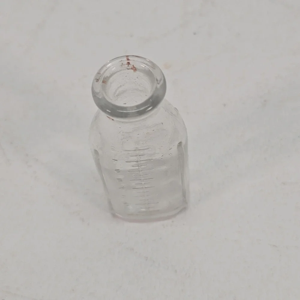 Vintage Glass Baby Doll Bottle Embossed Dog Wetting toy
